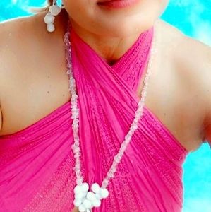 White hand glass necklaces designed by Alesia